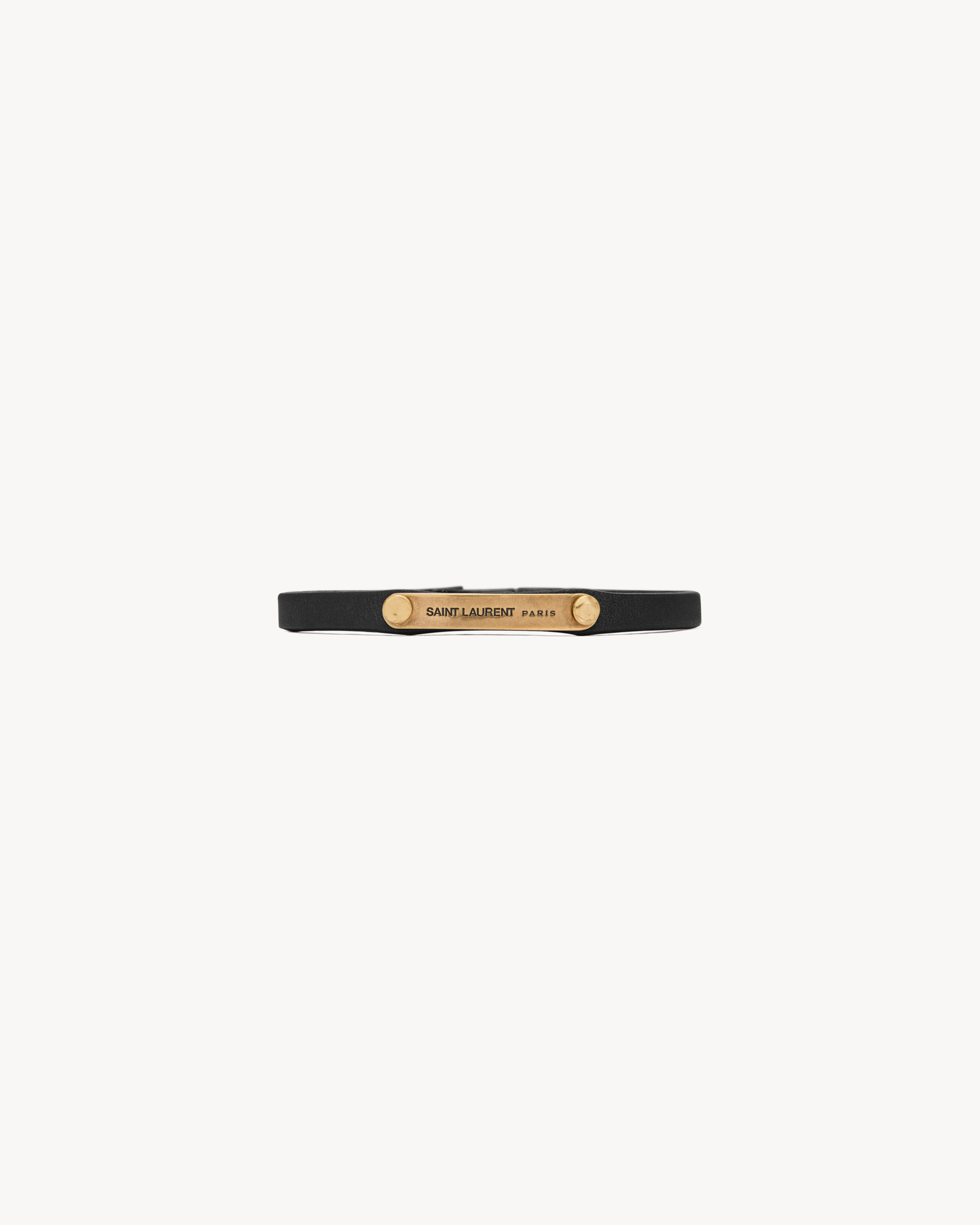 Pulsera placa ID Saint Laurent de piel lisa y metal