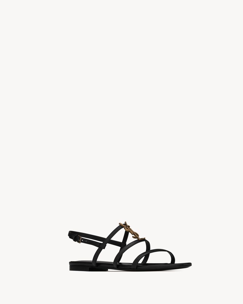 Cassandra Flat Sandals In Smooth Leather With Gold Tone Monogram Saint Laurent Singapore Ysl Com