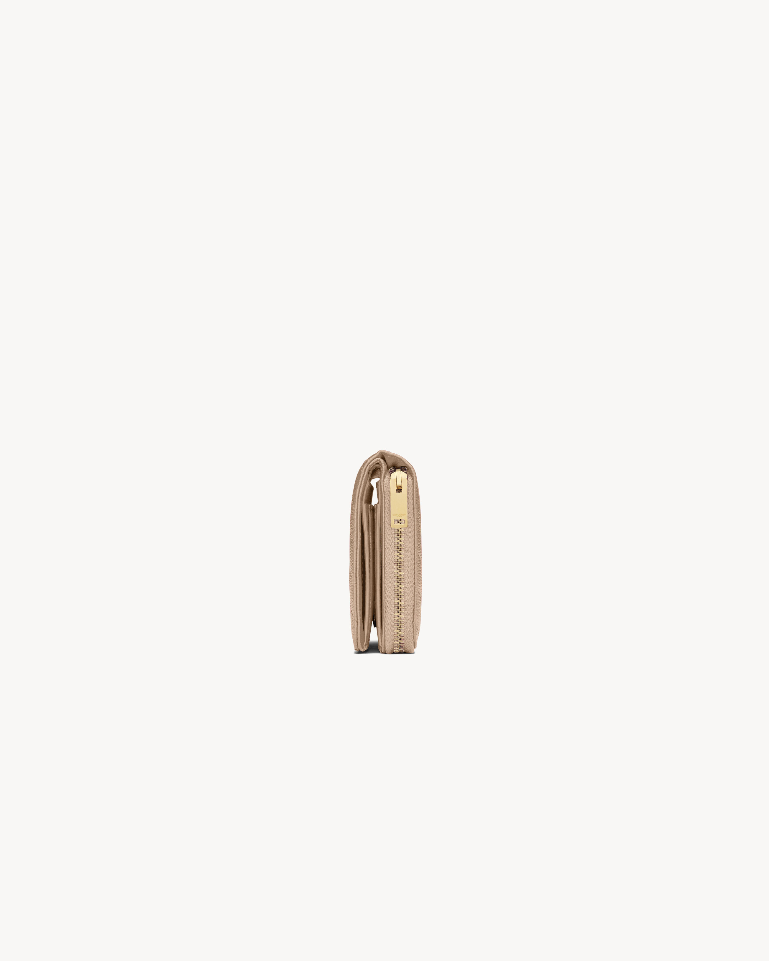 CASSANDRE MATELASSÉ compact zip around wallet in grain de poudre leather