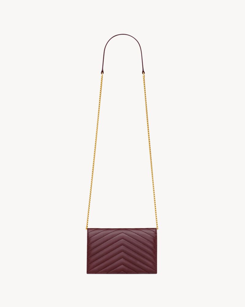 CASSANDRE ENVELOPE CHAIN WALLET IN LAMBSKIN