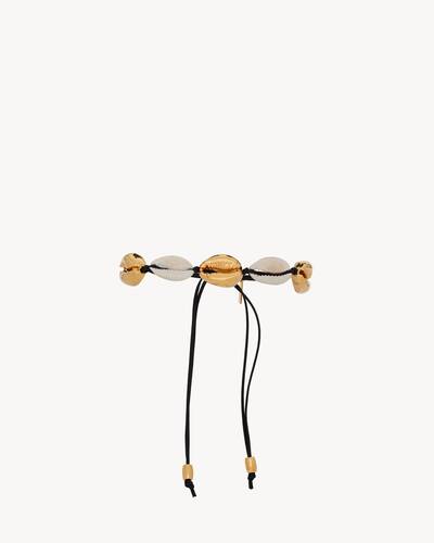 cowrie shell bracelet in leather, seashell and metal
