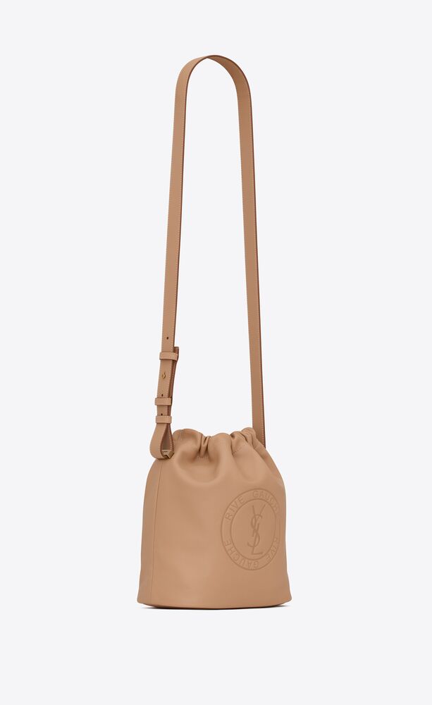 RIVE GAUCHE laced bucket bag in smooth leather | Saint Laurent | YSL.com