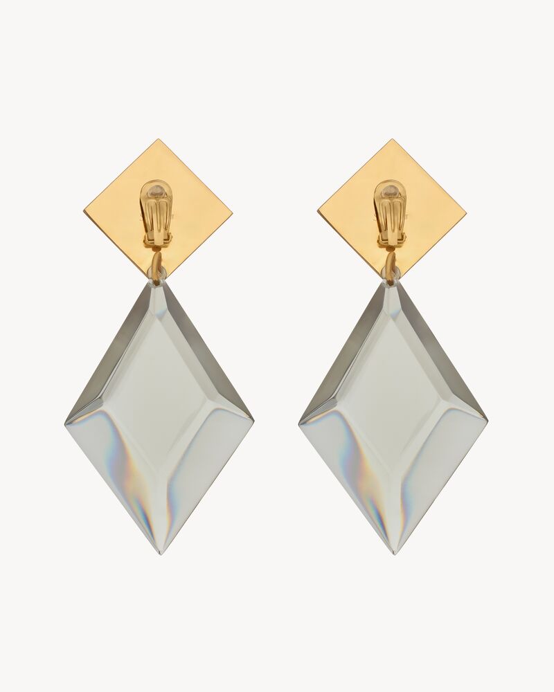 Boucles d’oreilles pyramide en résine et métal.