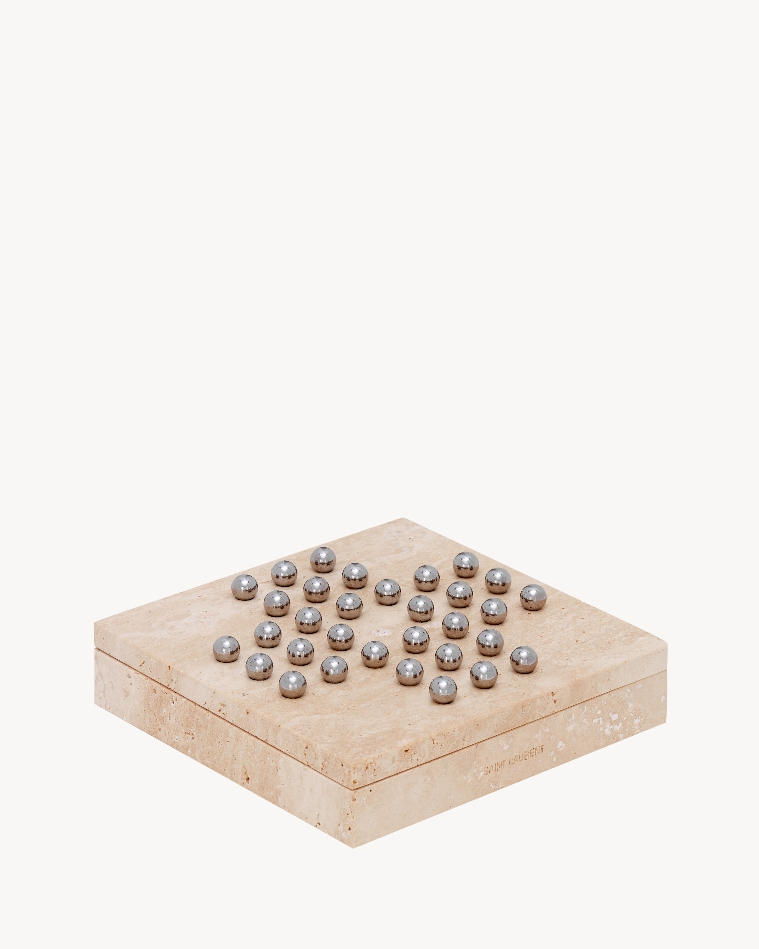 SOLITAIRE IN TRAVERTINE
