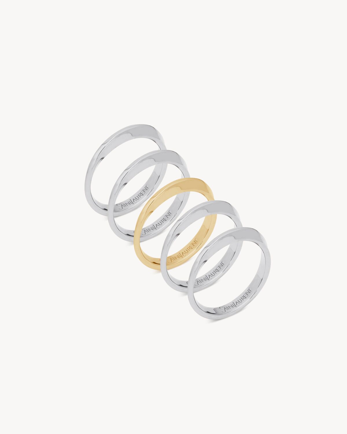 twist rings in 18K grey gold and 18K yellow gold