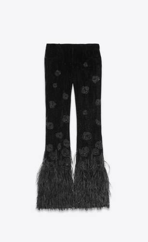 flared pants in embroidered velvet and feathers