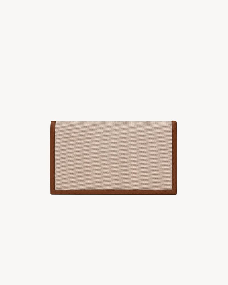 Pochette Uptown de lona y piel lisa