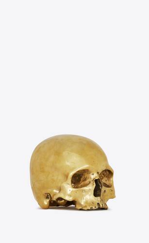 skull paperweight in metal