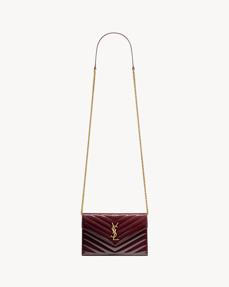 CASSANDRE envelope chain wallet in patent leather