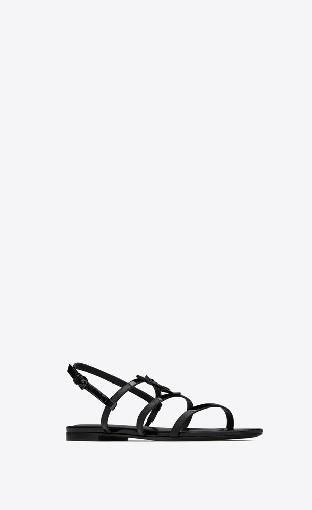 CASSANDRA flat sandals in patent leather with black monogram | Saint Laurent | YSL.com