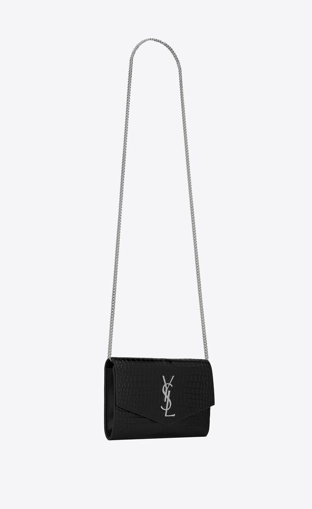 — YSL's envelope chain wallet gives casual dressing